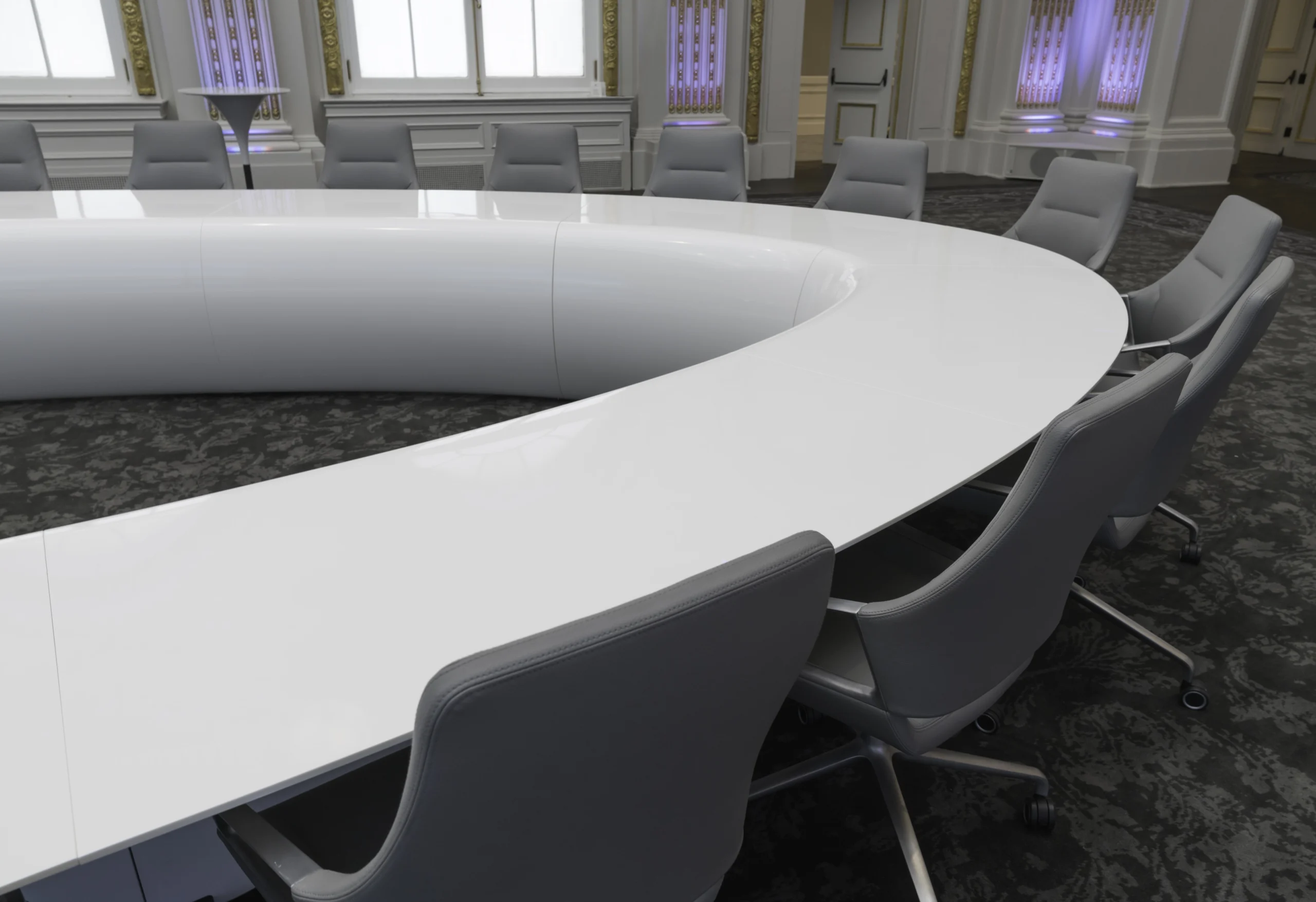 Polished Corian Boardroom Table shown with Chairs