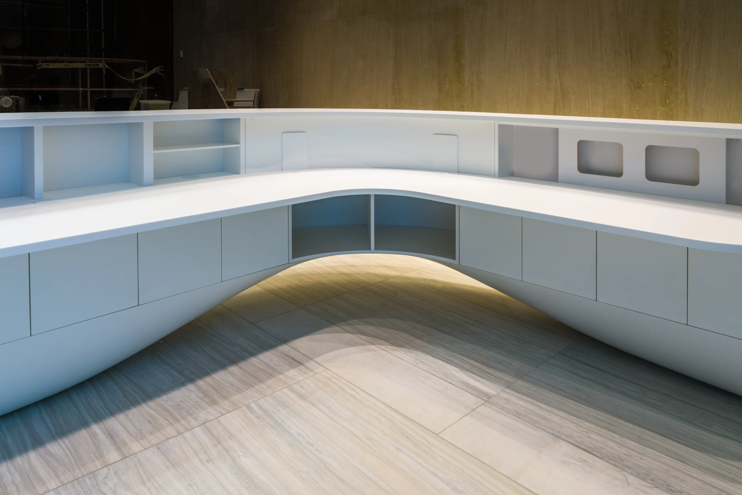 A white desk with shelves.